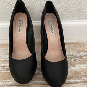 Black closed toed pumps with rhinestone heal